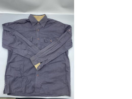 This men's dark blue, long-sleeved, button-down shirt is from the H&M brand.