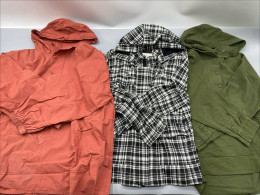 Set of 3 A hooded windbreaker and an anorak jacket, which is a lightweight coat designed to protect against wind and light rain.
