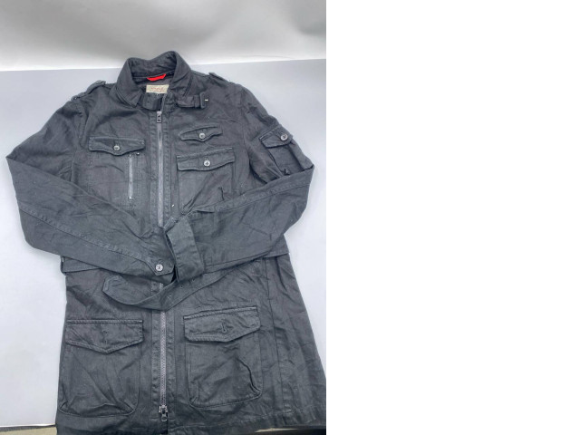 Brandit Britannia summer jacket, featuring a raw washed cotton canvas material in a vintage-style field jacket design. Brandit Britannia summer jacket, featuring a raw washed cotton canvas material in a vintage-style field jacket design.