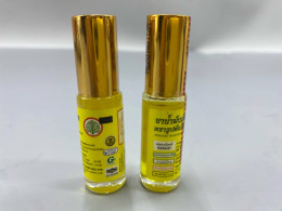 Set of 2 Yellow Thai herbal oil with a roller ball applicator for easy application. Bodhi Tree brand.