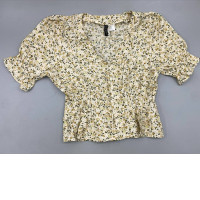 This floral print peplum blouse from H&M features a V-neck and short, puffy sleeves.