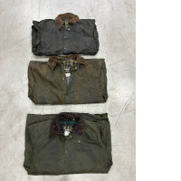 a set of three work jackets
