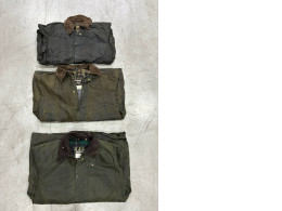 a set of three work jackets