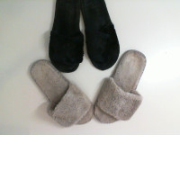 A set of 2 pairs of house slippers