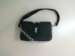 Black bag with a short strap