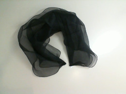 Black scarf on the shoulders Black scarf on the shoulders