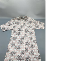 Vintage pink printed dress with short sleeves. Vintage pink printed dress with short sleeves.