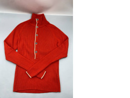  ribbed knit sweater featuring a button-down collar and contrasting trim.