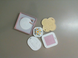 A set of 5 ceramic plates with a pattern