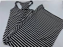 Black sleeveless maxi dress with white stripes Black sleeveless maxi dress with white stripes