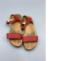 Handmade red genuine leather sandals by Autentica Avarca Pons. Handmade red genuine leather sandals by Autentica Avarca Pons.