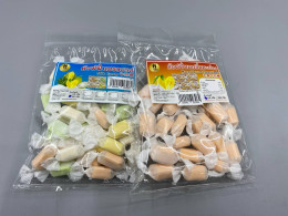 Set of 2 Milk-flavored toffee with mango flavor.