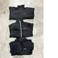 Set of 3 The black waterproof Berghaus rain jacket is likely the Deluge Pro or Aquafoil model.