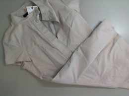 Short beige dress with a zipper Short beige dress with a zipper