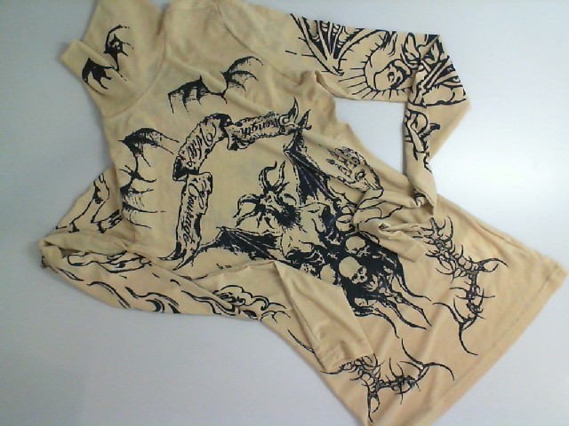 Beige turtleneck with black pattern Beige turtleneck with black pattern