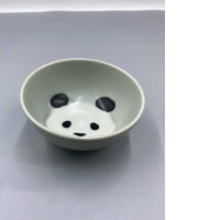 Hasami glass-glazed rice bowl with a black panda design.
