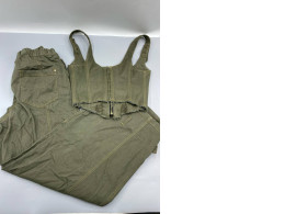 This olive-colored Edikted Lottie Washed Denim set features a structured crop top with a front-zip closure and matching trousers. 