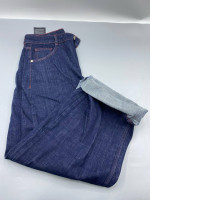 Dark indigo jeans, loose fit or wide leg.