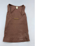 brown ribbed tank top from the brand Fica Spec. brown ribbed tank top from the brand Fica Spec.