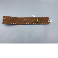 Stradivarius wide multi-studded belt in brown featuring mixed metal studs and a gold-tone buckle. 