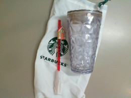 Plastic Starbucks cup with straw in a bag Plastic Starbucks cup with straw in a bag
