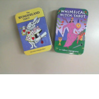 Set of 2 tarot decks in metal packaging The wonderland Tarot. Whimsical witch tarot