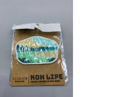 Embroidered patches or stickers for clothing.