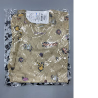 Brown t-shirt with Playboy graphic. Brown t-shirt with Playboy graphic.