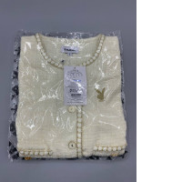 Women's cream tweed jacket by Playboy.