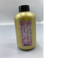 The Davines This Is A Curl Building Serum is a hair care product designed to define and add elasticity to curly or wavy hair. 