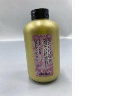 The Davines This Is A Curl Building Serum is a hair care product designed to define and add elasticity to curly or wavy hair. 