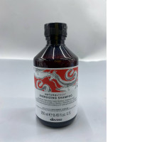 This is a bottle of Davines Naturaltech Energizing Shampoo, which is designed for fragile and thinning hair. 