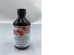 This is a bottle of Davines Naturaltech Energizing Shampoo, which is designed for fragile and thinning hair. 