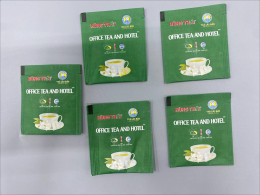 Set of 5 Jasmine, Hong, and Peanut teas in special office packaging.