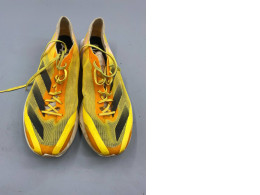 Adidas Adizero Adios 8 running shoes in the Spark Orange/Ivory/Black colorway Adidas Adizero Adios 8 running shoes in the Spark Orange/Ivory/Black colorway