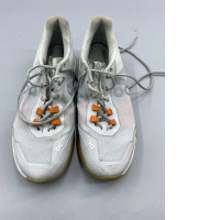 These white tennis shoes are the On THE ROGER Advantage Pro. These white tennis shoes are the On THE ROGER Advantage Pro.
