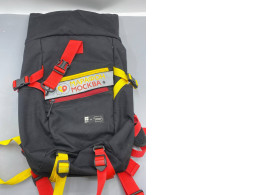 This black backpack has red and yellow straps and is from the Moscow Marathon.