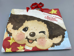 shopping bag featuring a special "Monchhichi x Paragon" collaboration for New Year celebrations. 