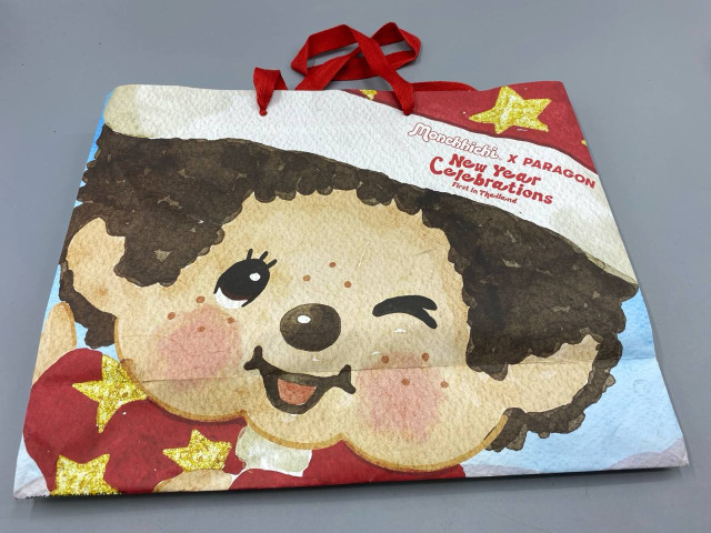 shopping bag featuring a special "Monchhichi x Paragon" collaboration for New Year celebrations. shopping bag featuring a special "Monchhichi x Paragon" collaboration for New Year celebrations.