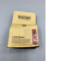 bag of medium-roast specialty coffee beans from ROAST8RY coffee roasting lab in Thailand. 