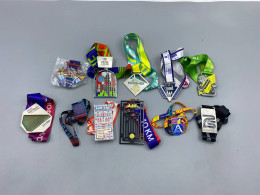 Set of 11 collection of marathon finisher medals from various running events, including the Moscow Marathon and "White Nights" race. 