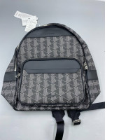 Lacoste The Blend Monogram Backpack in black. Lacoste The Blend Monogram Backpack in black.