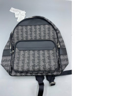 Lacoste The Blend Monogram Backpack in black. Lacoste The Blend Monogram Backpack in black.
