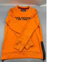 This orange crewneck sweatshirt with a graphic print resembles the Alcott brand, featuring a printed slogan and a side zipper.