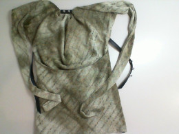 Women's blouse with a tie belt