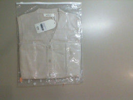 Beige knitted vest Beige knitted vest