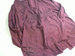 Red women's suit, shorts and shirt