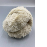 Soft earmuffs or those made of faux fur. Soft earmuffs or those made of faux fur.