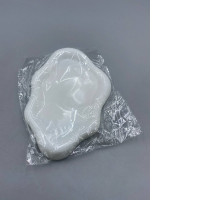 A cloud-shaped jewelry tray, also known as a plaster display plate.