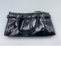A black leather shoulder bag with a silver buckle, similar in style to brands like Nine West.